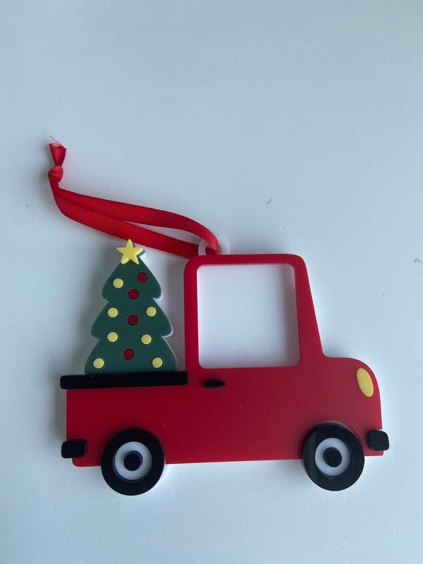 Red truck with tree ornament